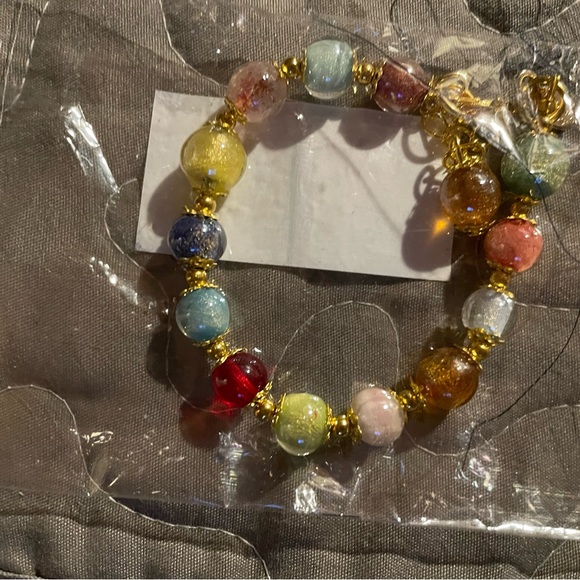 BRAND NEW SEALED  2 pouches 1 necklace 1 bracelet! - Picture 3 of 6